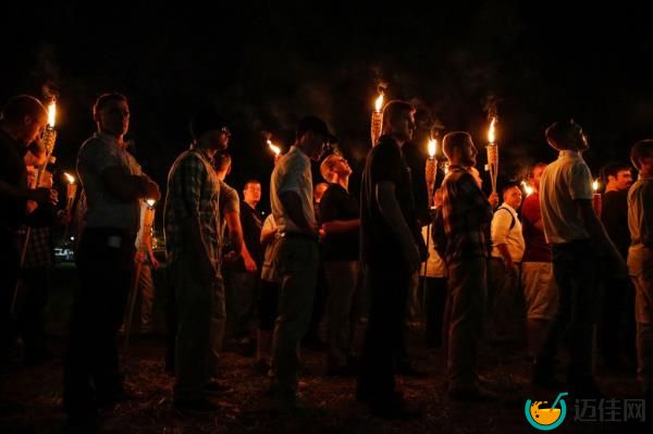 White natio<em></em>nalist groups marched with torches through the University of Virginia campus on Aug. 11, 2017, in Charlottesville, Va.