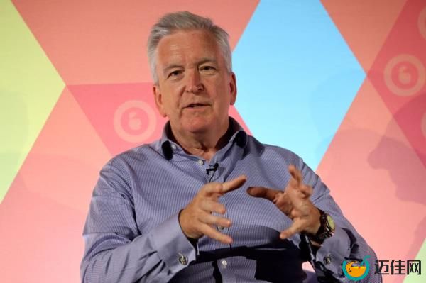 Adrian Hallmark, Chairman and CEO of Bentley Motors Ltd, sitting in a chair at The Innovation Factory Stage event, during Advertising Week Europe in London