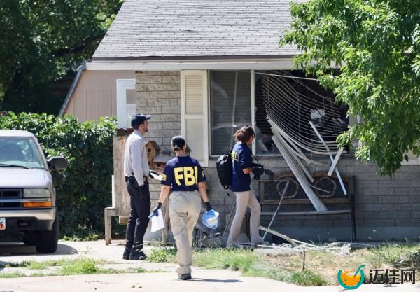 Agents at the scene of the shooting in Provo, Utah.