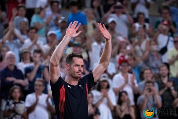 Andy Murray of Britain cries and waves to the spectators after he and his partner Daniel Evans defeated by Taylor Fritz and Tommy Paul