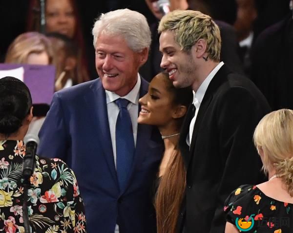 Bill Clinton takes a picture with Ariana Grande and Pete Davidson at Aretha Franklin