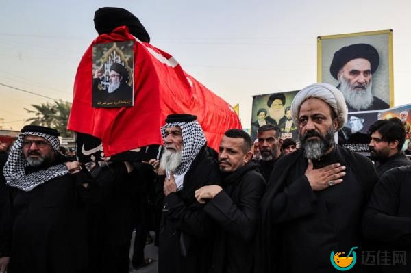 Muslim men clad in black robes carry the coffin of Hezbollah founder Hassan Nasrallah.