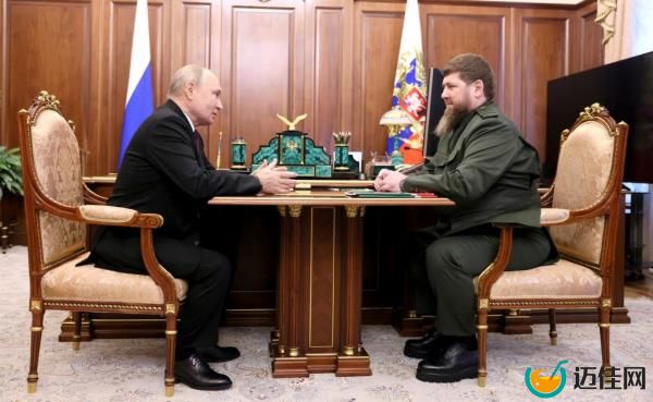 Russian President Vladimir Putin, left, speaks with Chechen leader Ramzan Kadyrov, right, during a face-to-face working meeting at the Kremlin in Moscow, Russia. 
