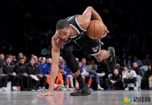 Mikal Bridges trips as he dribbled down the court during the Knicks