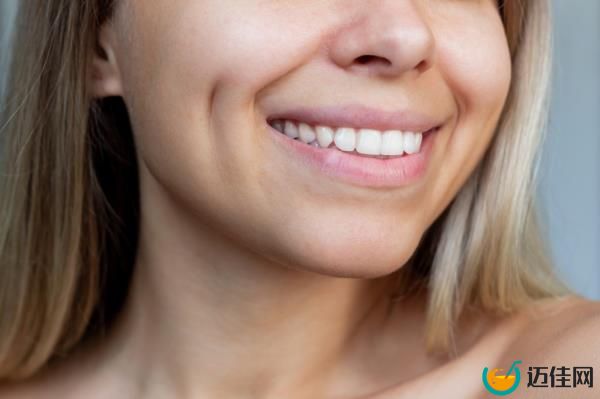 Woman with dimples smiling