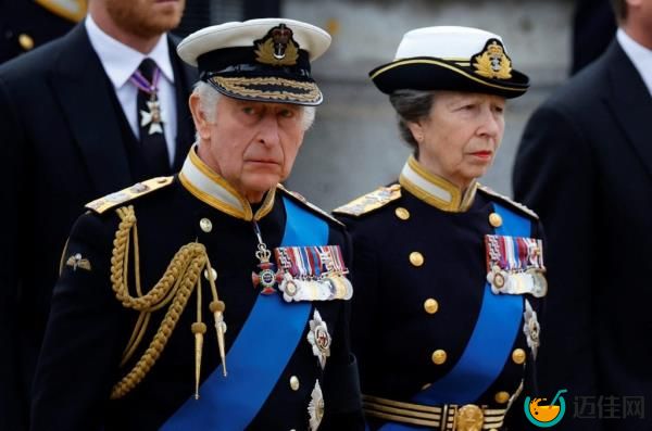 King Charles III and Princess Anne in military uniforms arriving at the state funeral of Queen Elizabeth II in London, England