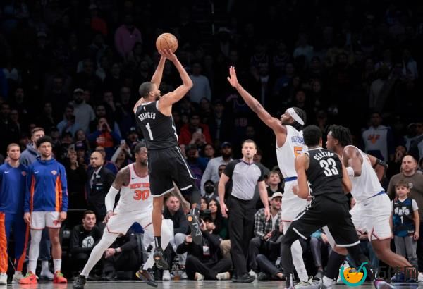 Mikal Bridges #1 of the Brooklyn Nets puts up a shot as Precious Achiuwa #5 of the New York Knicks is too late to defend