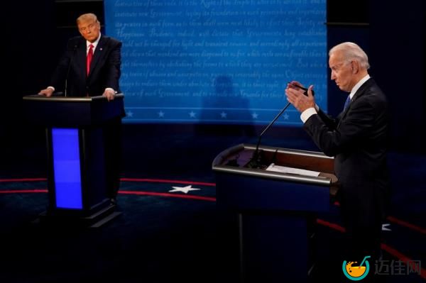 Joe Biden answers a question as President Do<em></em>nald Trump listens during the second and final presidential debate at the Curb Event Center at Belmont University in Nashville, Tennessee, U.S., October 22, 2020.