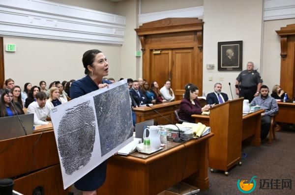 Prosecutor Sheila Ross presenting closing arguments in Athens-Clarke County Superior Court, holding a poster, during trial of Jose Ibarra