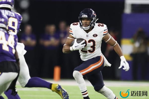 Bears running back Roschon Johnson carries the ball against the Vikings on Monday, Nov. 27, 2023, at U.S. Bank Stadium in Minneapolis. 