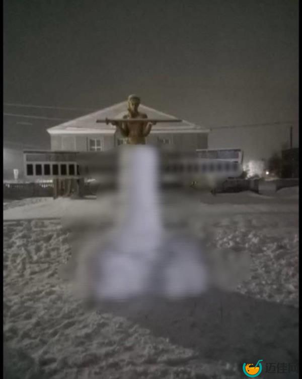 Blurred erect snow penis in front of statue. 
