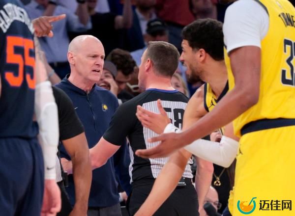 Indiana Pacers head coach Rick Carlisle speaks with referee Josh Tiven #58 after a call during the fourth quarter. 