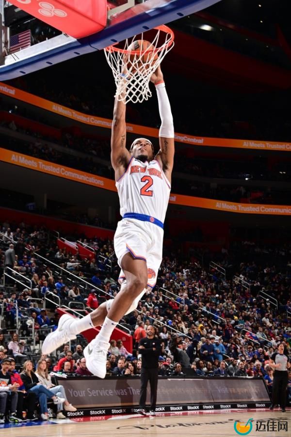 Miles McBride dunks during the Knicks