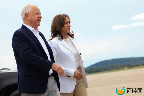 U.S. Vice President and Democratic presidential candidate Kamala Harris and her running mate Minnesota Governor Tim Walz walk as they prepare to depart at Chippewa Airport in Eau Claire, Wisconsin, U.S., August 7, 2024