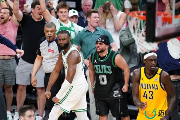 Boston Celtics guard Jaylen Brown (7) reacts after his three point basket sending the game into overtime against the Indiana Pacers in the fourth quarter during game one of the eastern co<em></em>nference finals for the 2024 NBA playoffs at TD Garden.