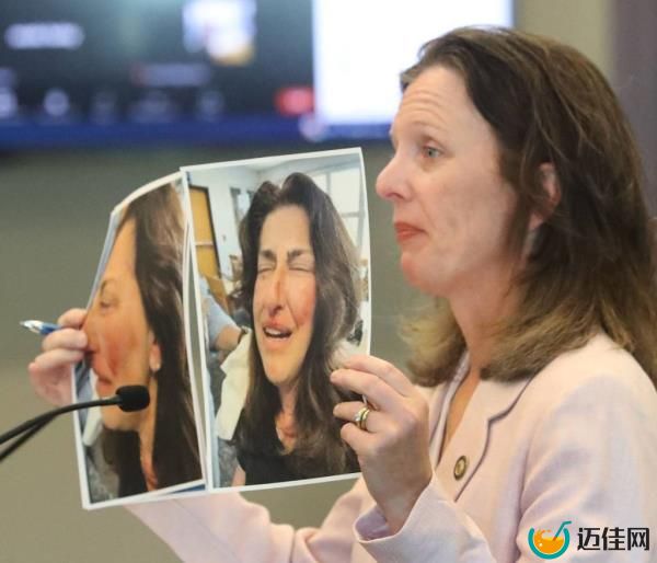 Assistant State Attorney Melissa Clark holds photos of Joan Naydich taken after the Feb. 2023 attack, during a May 1, 2024 court hearing.
