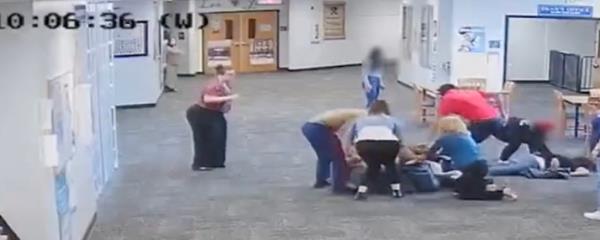 Several staff members were needed to remove Depa from Naydich and hold him to the floor.