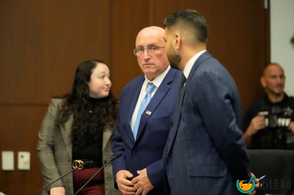 Robert E. Crimo Jr., talks to his attorney George Gomez Monday. 