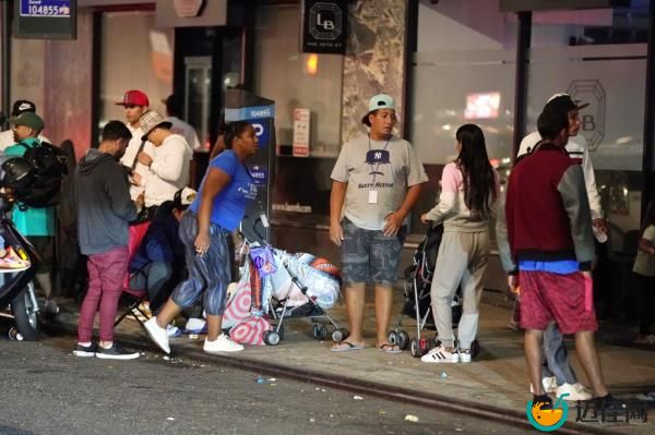 Migrants are seen outside NYC