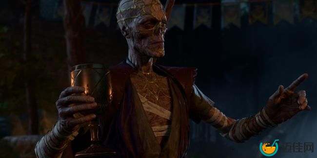 Withers speaks to guests at Patch 5 epilogue party with cup in hand in Baldur