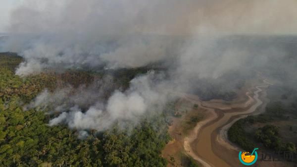 Smoke from a wildfire in the Amazon rainforest near a dry river in Amazo<em></em>nas state, Brazil, September, 2023.