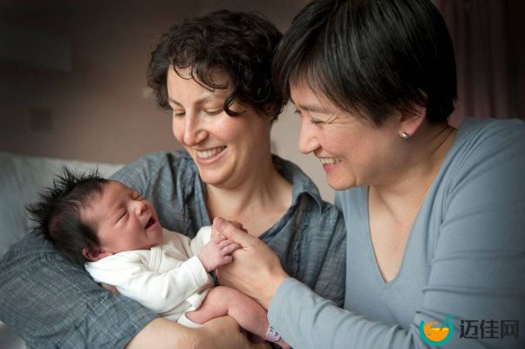 Penny Wong and Sophie Allouache with their daughter Alexandra, when she was born in 2011.