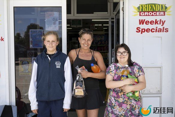 Kristy Armstrong and her daughters Mia and Phoebe at the Cape Woolamai IGA on Phillip Island. They have gas at home and a day off together so they weren’t too concerned.